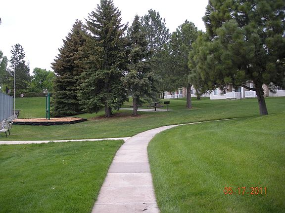 Green belt with tennis courts & B-Q grills