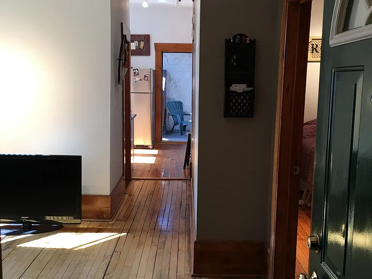 The back door opens on to a private deck and the large garage roof deck is one staircase up.