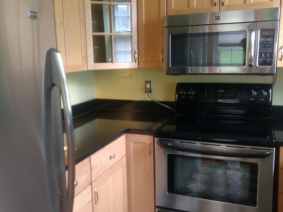 Kitchen showing current flooring and cabinets (replaced in 2018)
