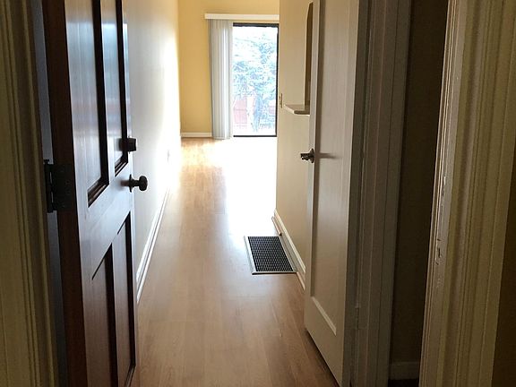 entry to unit with coat closet on the right