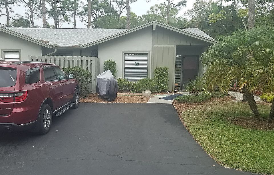 Front door, 2 parking spots.