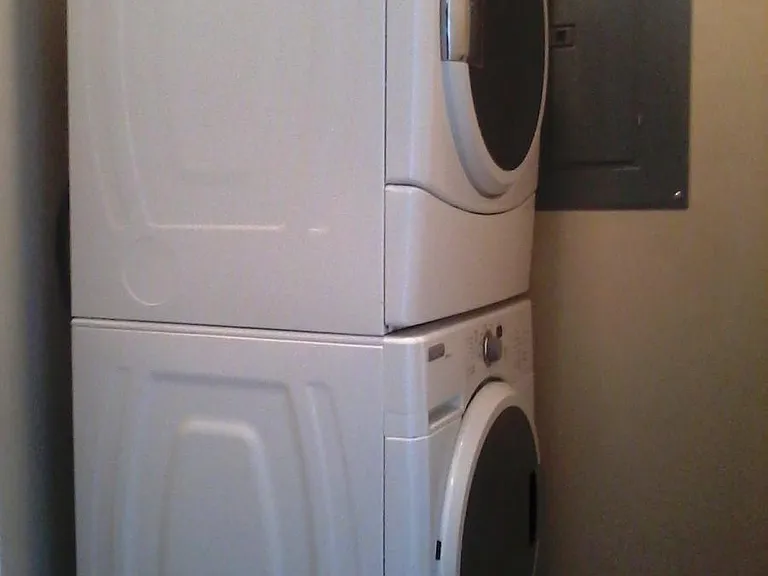 Laundry Room - Front Load Washer/Dryer included with the home