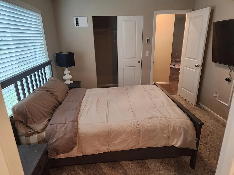 Main floor Bedroom with WIC and attached bathroom