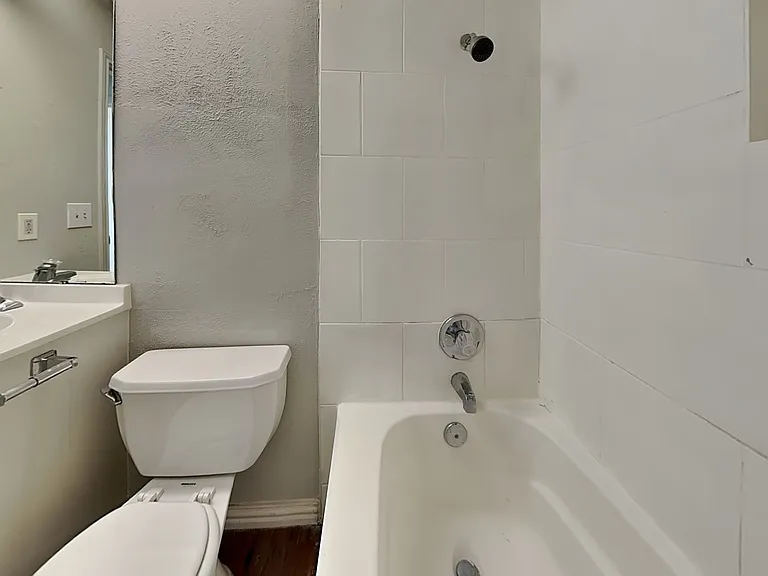 This bathroom features a clean