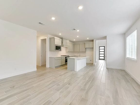 Plan 3049 kitchen dining - staged