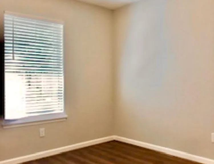 Third bedroom. Approximately 10'8"x11'6".