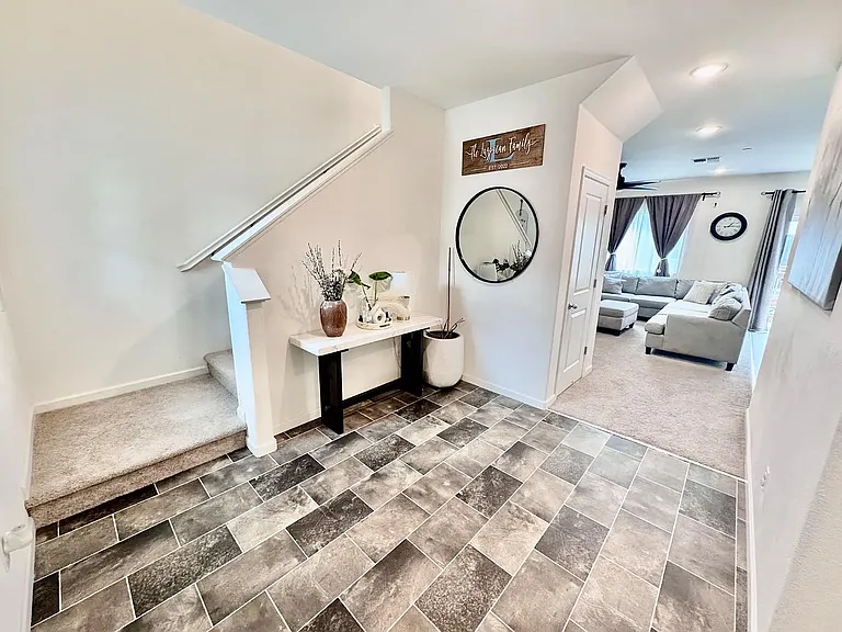 Entrance view to living and up stairs
