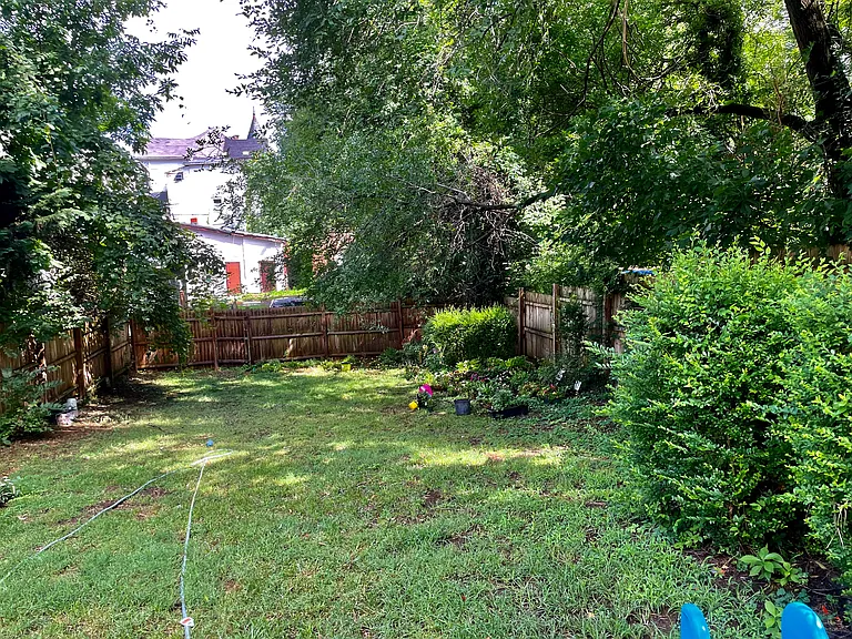 Large Shared Fenced In Backyard!