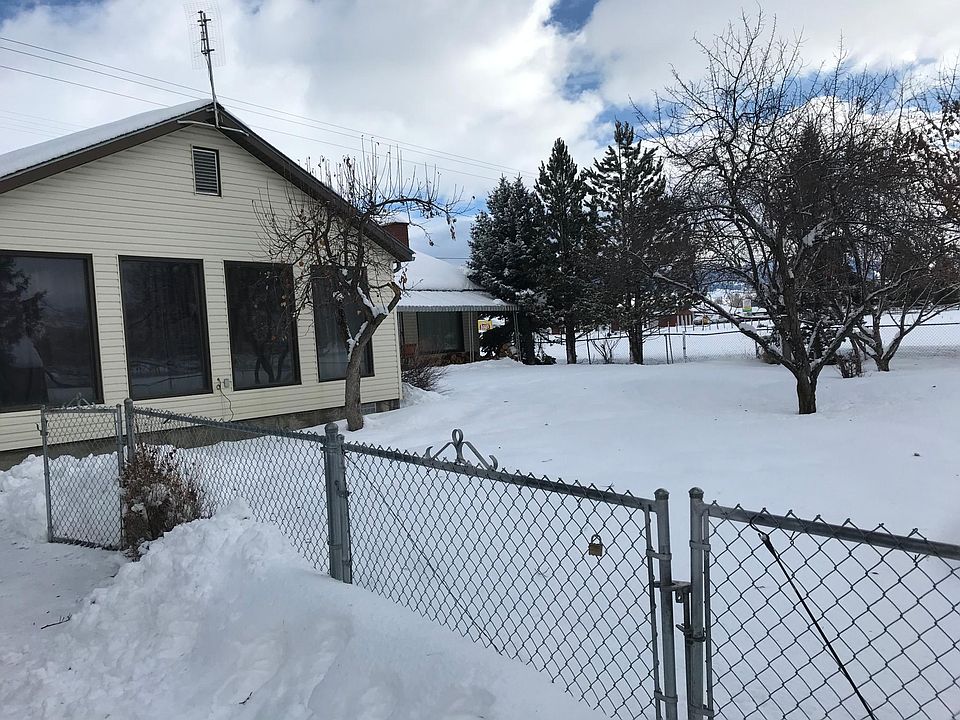 South side of home with part of the backyard.