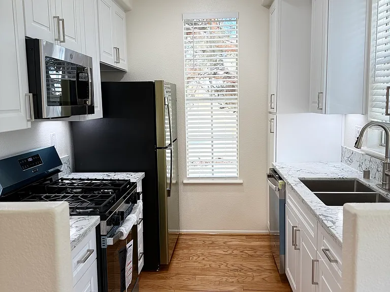 View of kitchen from dining area.