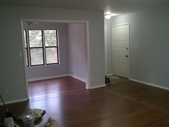 View of living room and sunroom