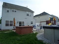 back yard w/hot tub & pool