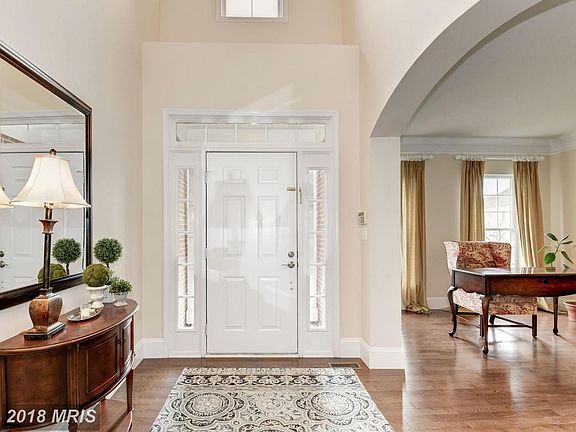 2 Story Foyer - Heavy Baseboard & Trim