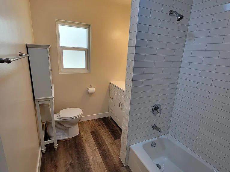 Bathroom with tiled shower