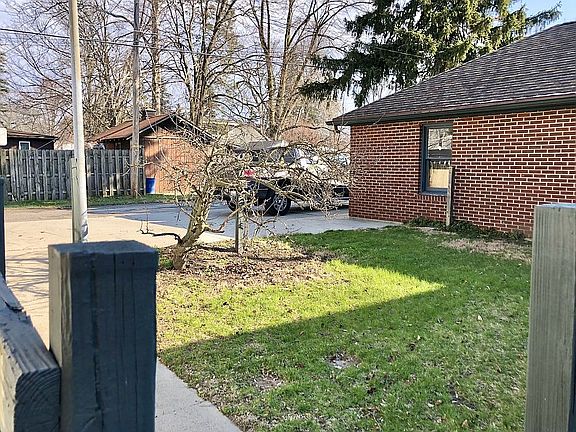 Back yard, 2 car garage