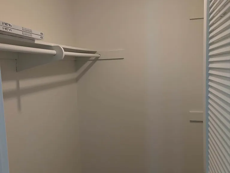 Large walk in closet in primary bedroom