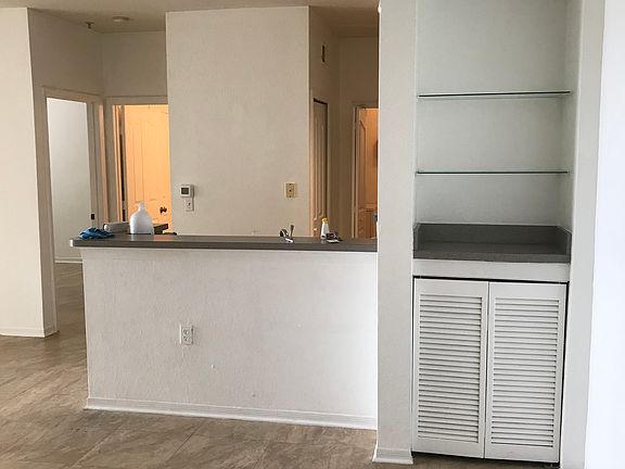 From entry to dining with bar from kitchen 
Lake view from kitchen and dining