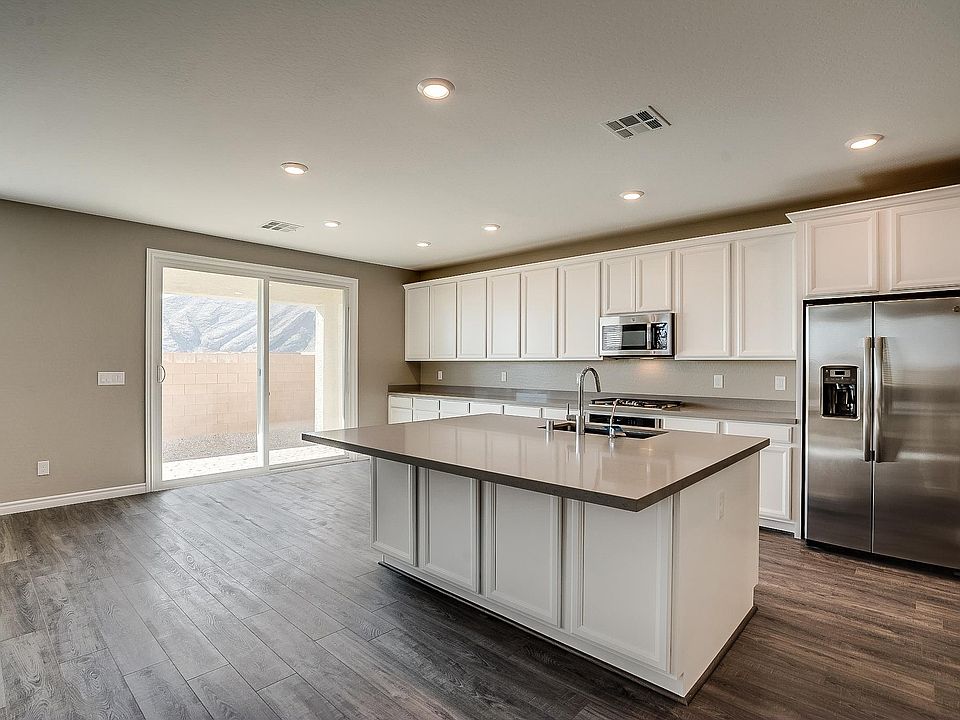 Kitchen provides brand new stainless steel appliances.