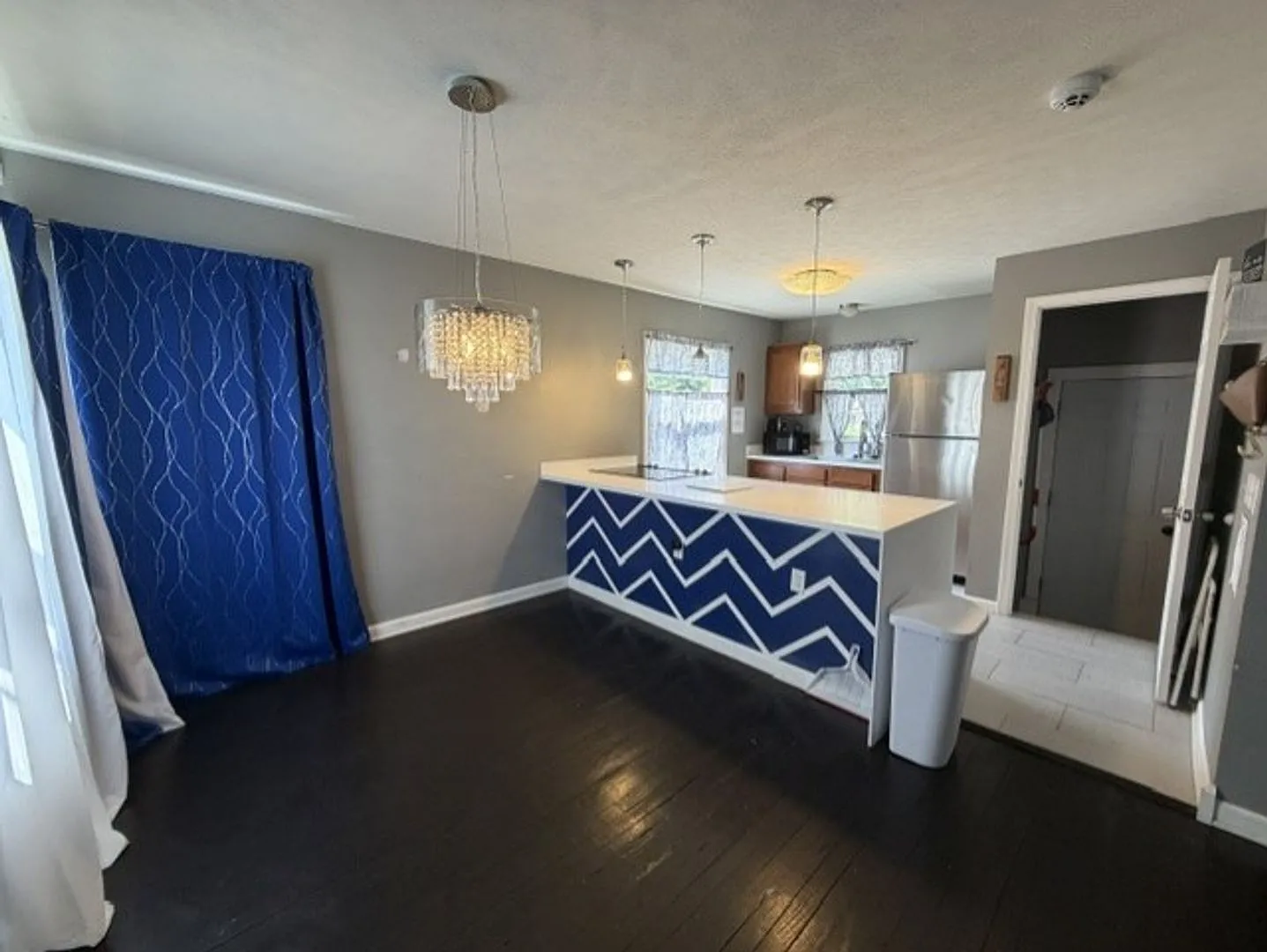 Updated 3BR Home with Open-Concept Kitchen, Bonus Lower-Level Bedroom & Garage — Photo 3