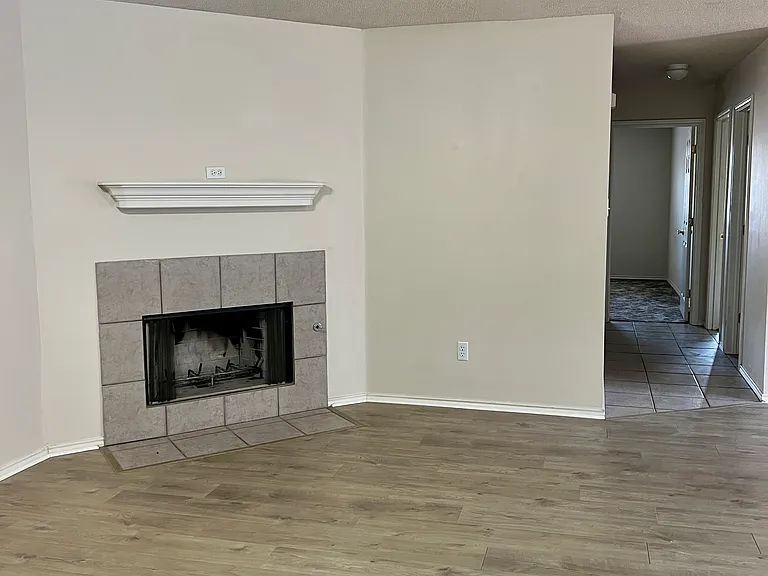 Romantic wood-burning fireplace (with gas for starting your logs). Fireplace mantle (perfect for hanging your stockings/garland at Christmas) including electrical outlet.