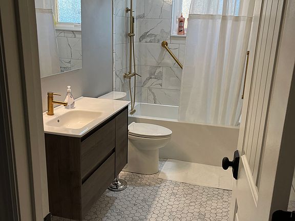 Roommate's private hall bathroom.