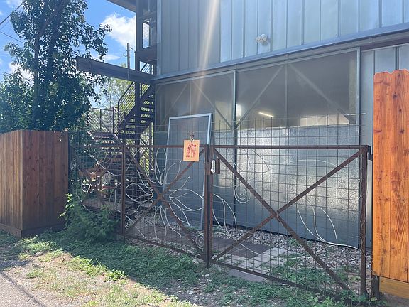 Gate from alley with keypad for entry