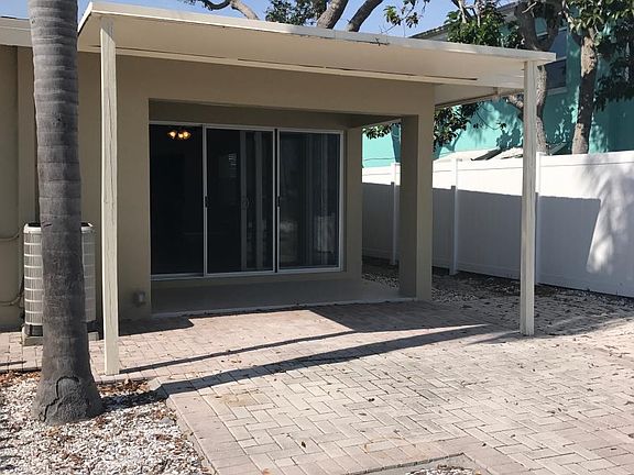 Large covered and open waterfront patio