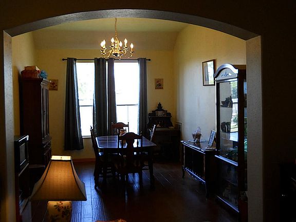 Formal Dining with wood like floors.