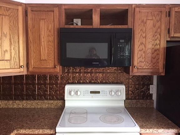 Kitchen, stove & microwave