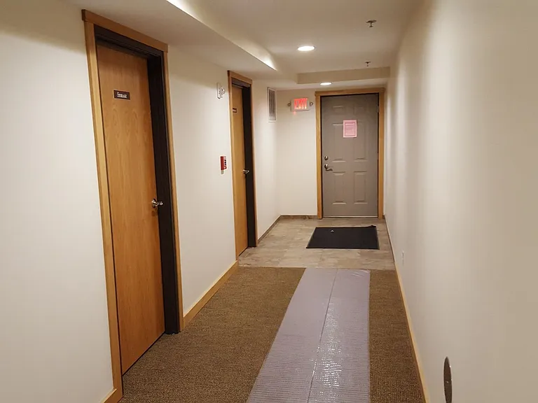 Lower level hallway. Side entry.