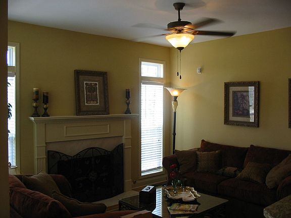Keeping room off kitchen with fireplace