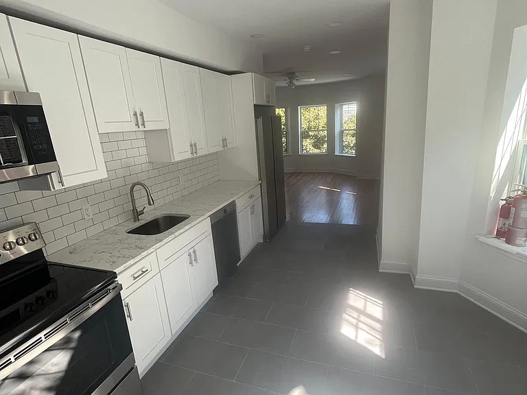 Kitchen opens to living room