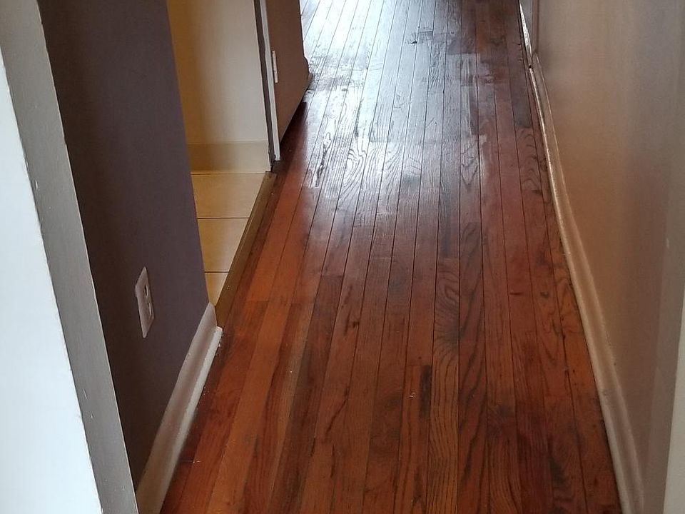 hallway to kitchen and living room .