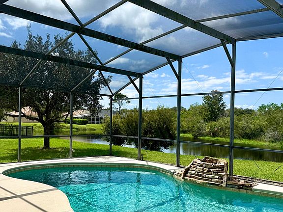 Sparkling Pool Overlooking Pond