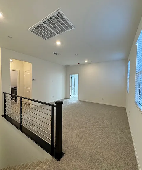 Large Loft with Smart tv wall pre-wire, laundry room access and primary suite separate from all other bedrooms