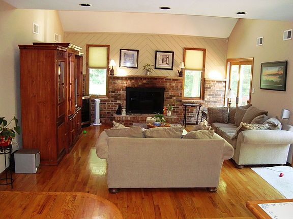 Family room with fireplace and sliders to deck