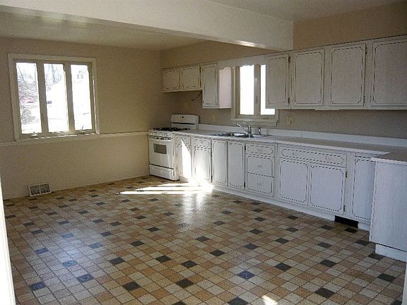 Spacious Kitchen with Door to Deck.