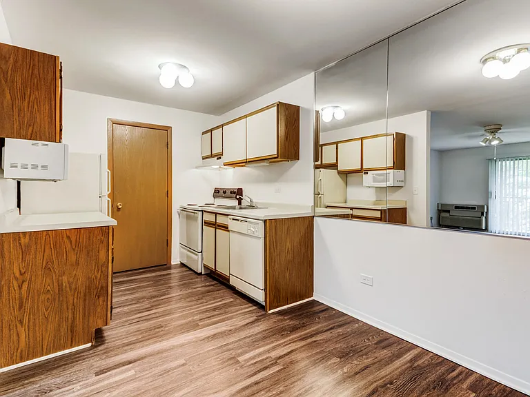 Classic Kitchen & Dining with Vinyl Plank Flooring
