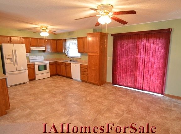 Kitchen/added pantry, cupboards on left, tile, and countertops 2008