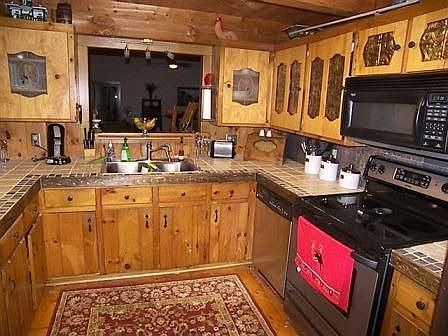 Large kitchen with tile, slate 