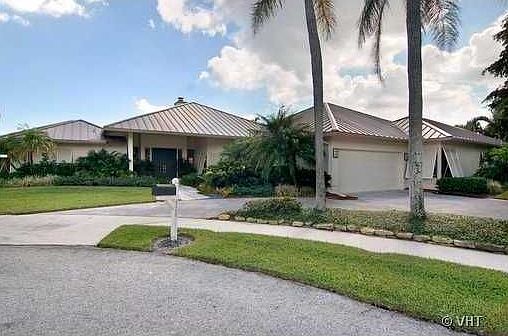 Home For Sale In Boca Bay Colony