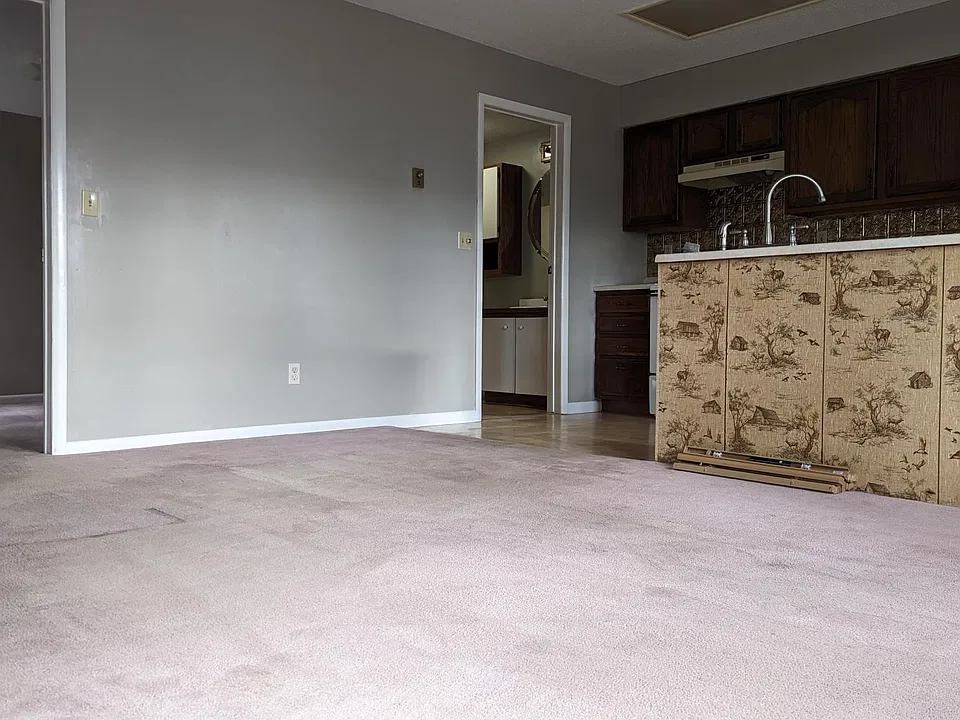 LIVING FACING KITCHEN AND BATHROOM