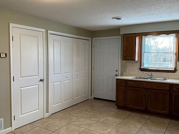 Utility and Washer /Dryer area