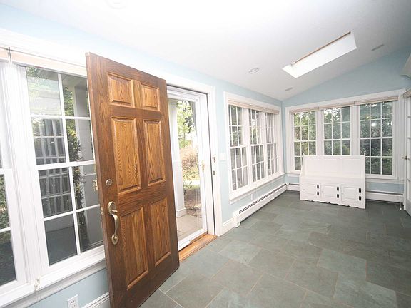 Welcome Foyer, also Mudroom Extending to Garage