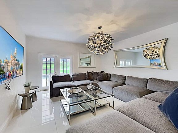 Entertaining living room with 70 inch Smart TV