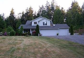 1st image of 8241 NE Forest Home Ln