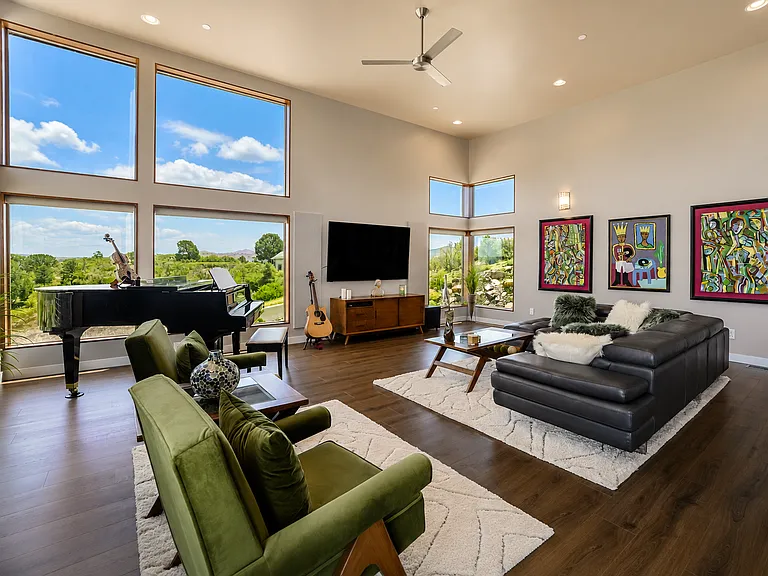 Giant Living Room with 13 ft ceilings including a drop down (not in photo) that has uplighting