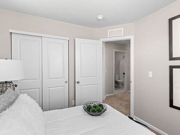 A view of the 3rd bedroom, closet and hallway entrance