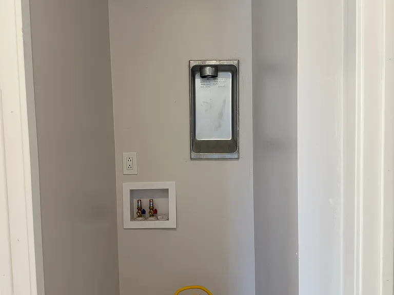 Space for a stacked washer and dryer. Landlord to provide.