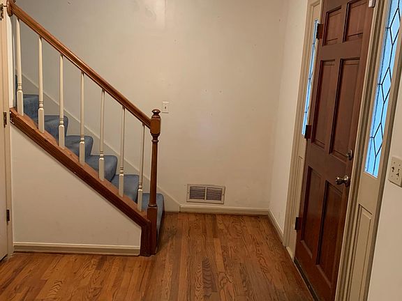 Entry with coat closet and stairs to second story